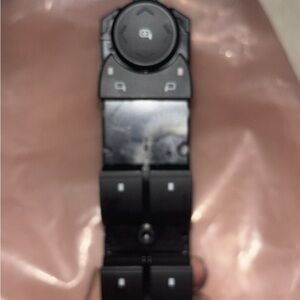 Chevy driver side master power lock window control unit.